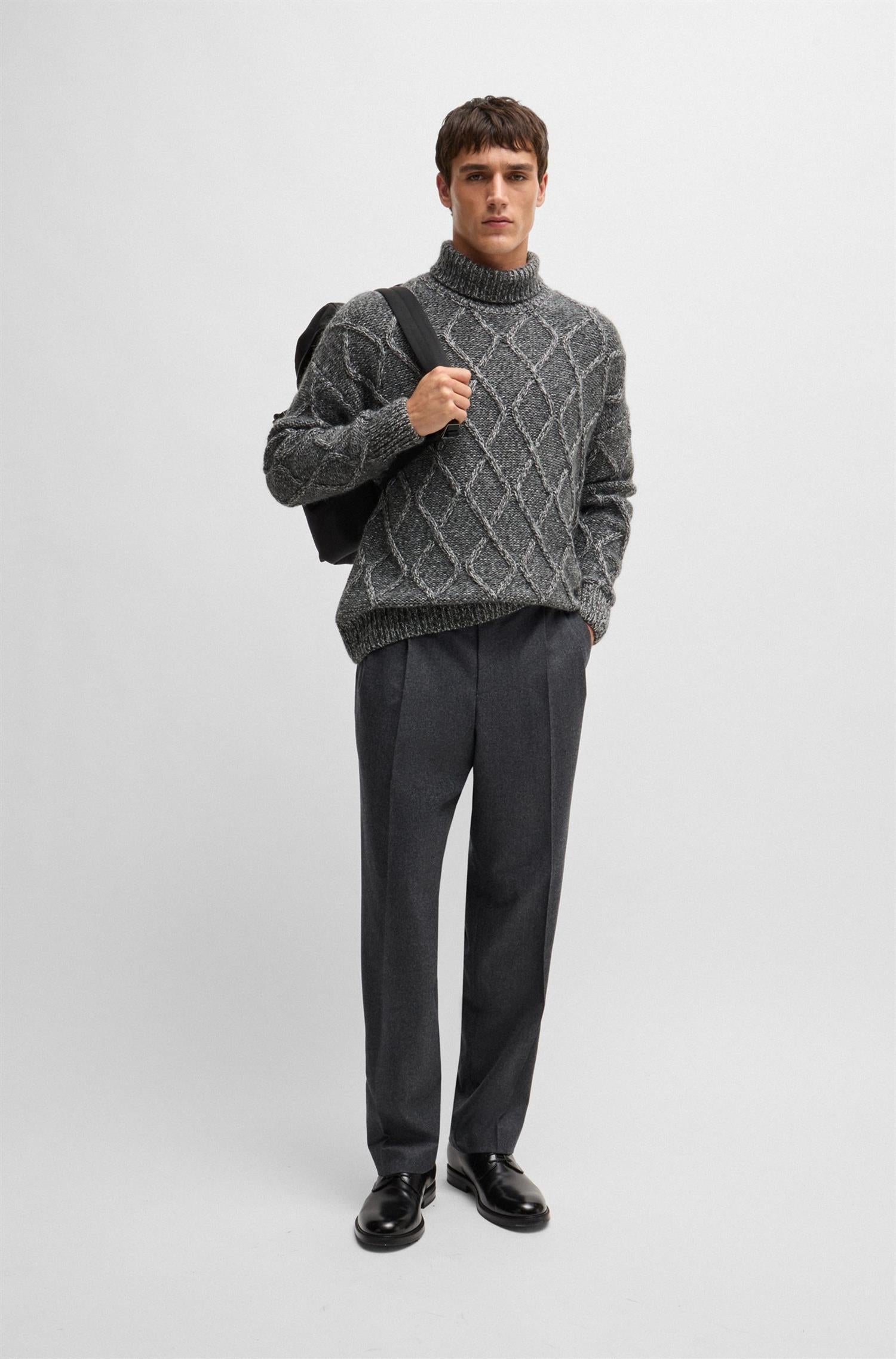 RELAXED-FIT SWEATER WITH CABLE-KNIT STRUCTURE