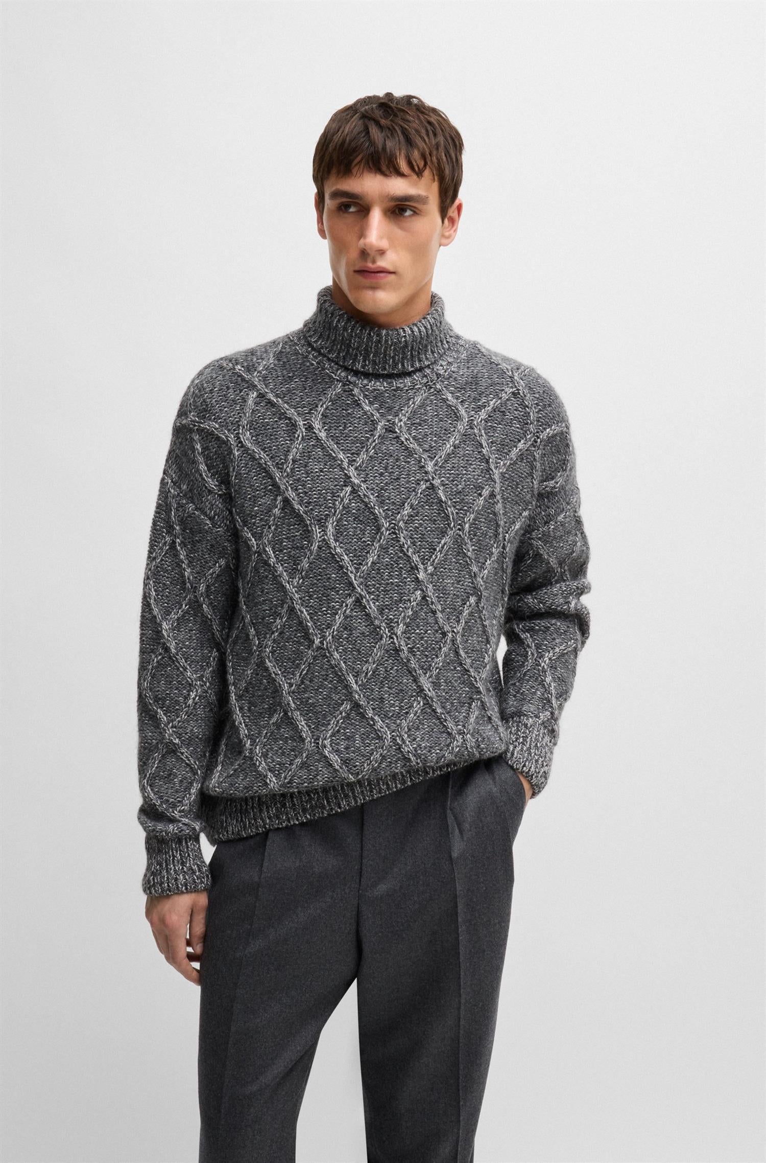 RELAXED-FIT SWEATER WITH CABLE-KNIT STRUCTURE